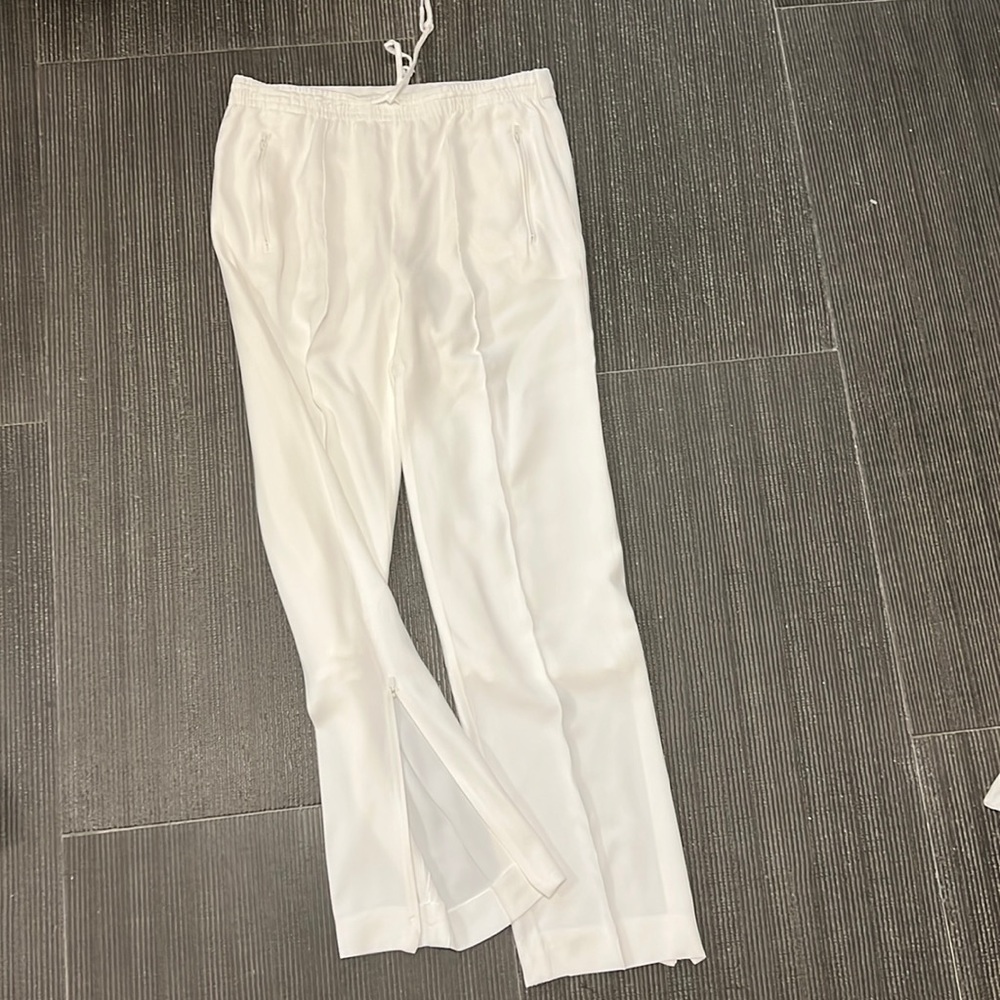 Beautiful like silk dress pant with open bottom super comfy and great looking!